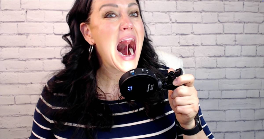 Carmen Ball demonstrating a myofunctional therapy suction hold exercise