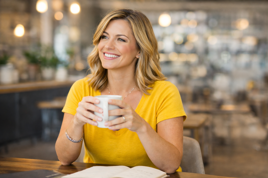 Female myofunctional therapist working on laptop and planning business tasks during early stages of building a therapy practice